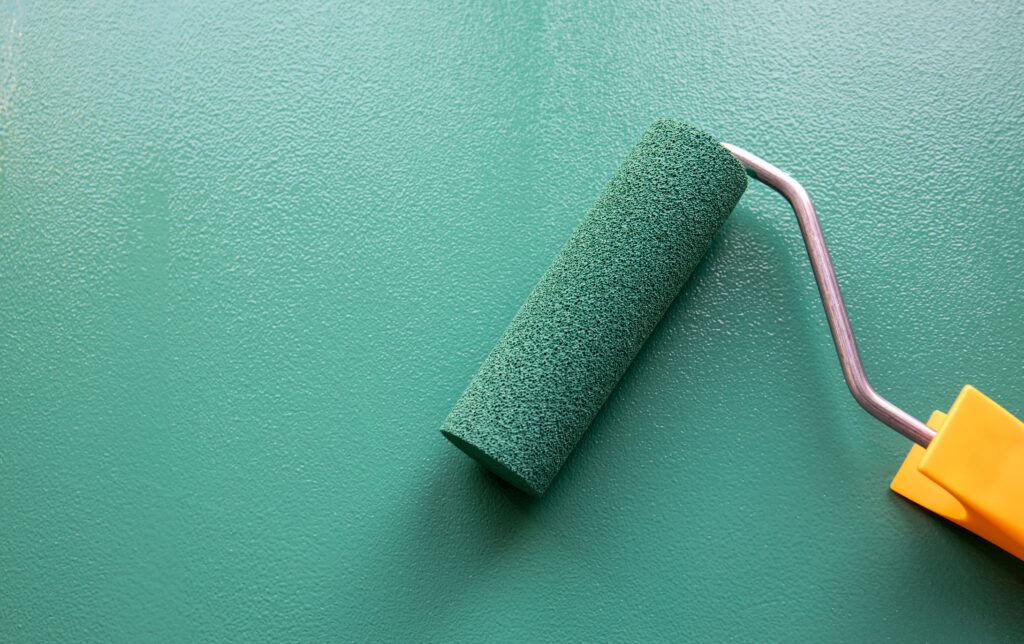 green fireproof paint with paint roller