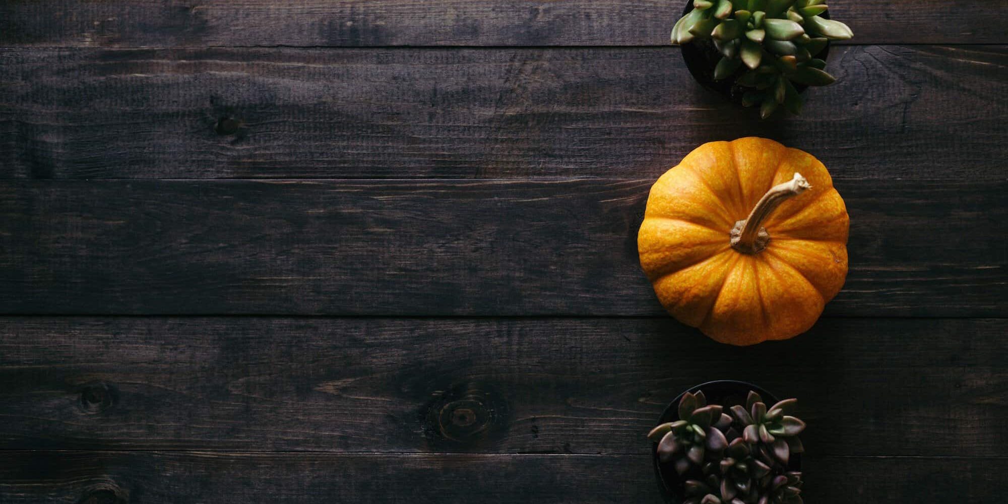 pumpkin on wooden table