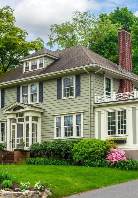 painted green american suburban home